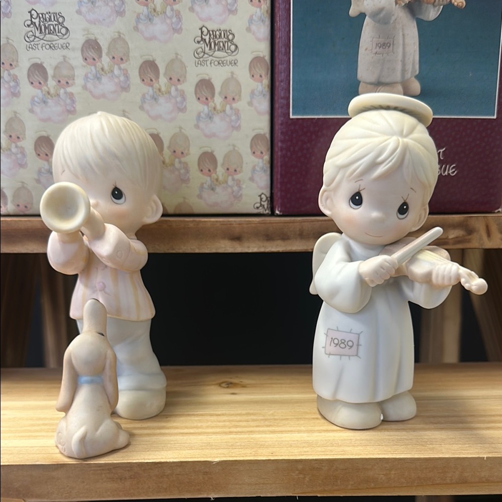 Precious Moments Boy with Trumpet and Girl with Violin Figurines